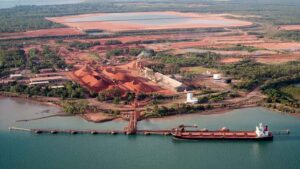 China-bound ... A ship loads bauxite at the mining port of Weipa, Qld. Pic: Getty