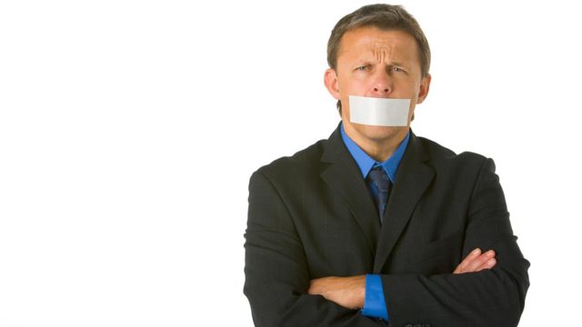 Mouth taped, not talking