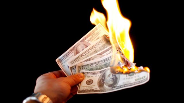 Setting your cash on fire would have been a similarly efficient way to lose it as investing in new tech stocks in 2015. Pic: Getty