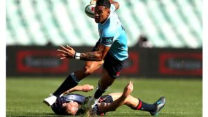 Izzy Folau of the Waratahs evades Reece Hodge of the Rebels in a weekend Super Rugby clash. Pic: Getty