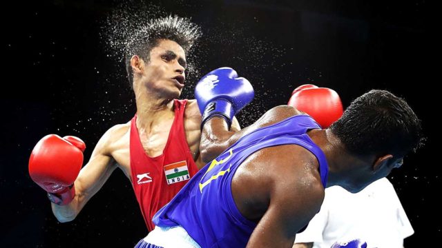 Gaurav Solanki of India belted by Ishan Vidanalange Bandara of Sri Lanka in their Men's Fly 52kg Semifinal bout at the Gold Coast Commonwealth Games on Friday. Pic: Getty
