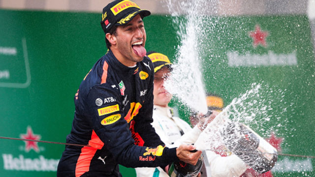 Race winner Daniel Ricciardo celebrates on the podium during the Formula One Grand Prix of China.