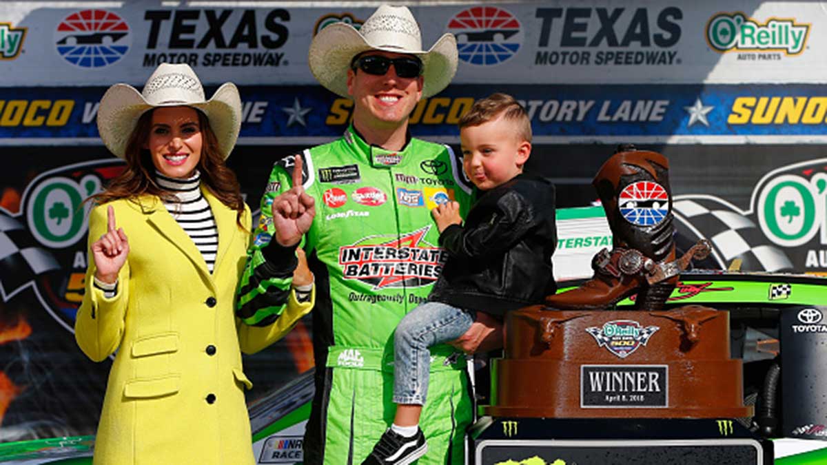 Kyle Busch poses in Victory Lane after winning the Monster Energy NASCAR Cup Series on April 8.