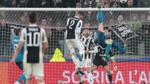 Cristiano Ronaldo of Real Madrid scores his sides second goal during the UEFA Champions League Quarter Final