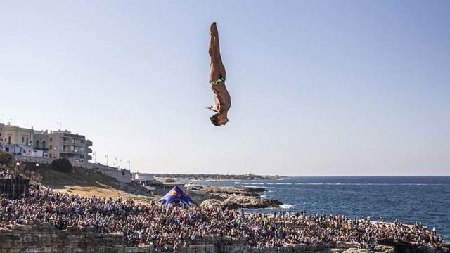 Jonathan Paredes of Mexico dives from the 27.5 metre platform in the 2015 Red Bull Cliff Diving series in Italy. Pic:Getty