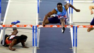 Ronald Levy (right) of Jamaica on his way to victory in the men's 60m hurdles final at Glasgow, Scotland in Feburary. Pic: Getty