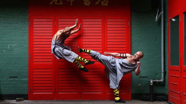 Shaolin monks pose in London's Chinatown in 2015. Pic: Getty