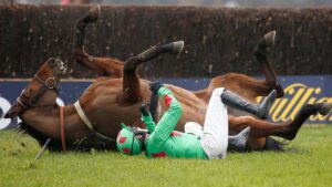 Tom Bellamy and Devil To Pay fall at Kempton Park racecourse in England, 2016. Pic: Getty