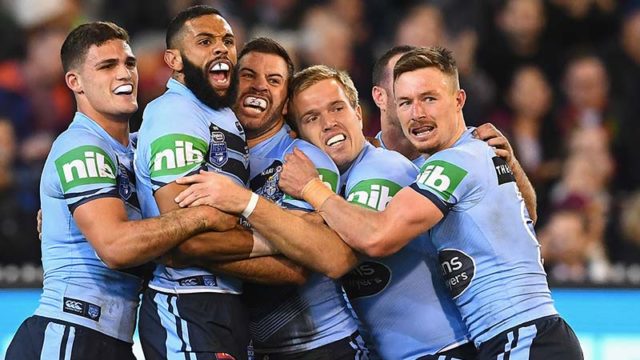 The NSW Blues celebrate their win in last night's NRL State Of Orgin opener at the MCG. Pic: Getty