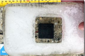 Talga concrete sample after melting 5cm depth of ice from 9v power.
