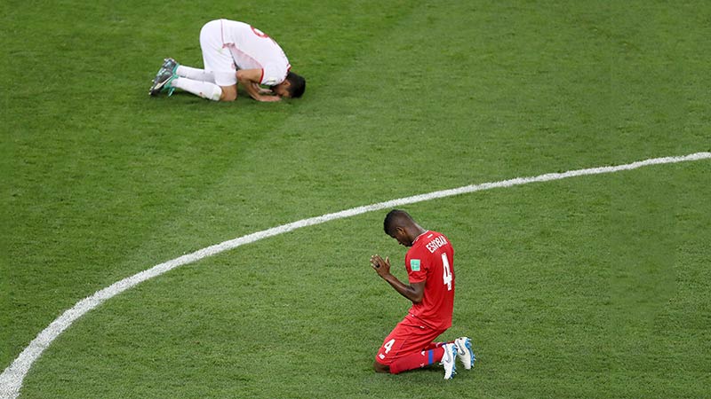 Panama's Fidel Escobar and Tunisia's Rami Bedoui after Tunisia won its first ever World Cup match today in Russia. Pic: Getty