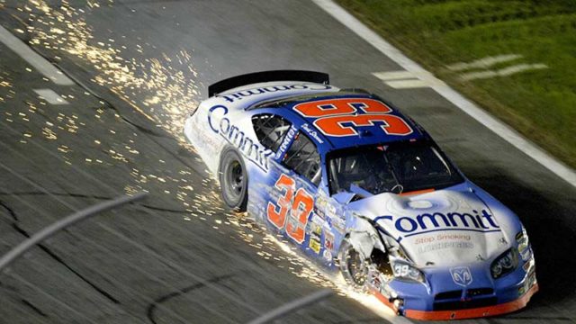 A driver blows a tyre during the UAW-GM Quality 500 in 2005 at North Carolina. Pic: Getty