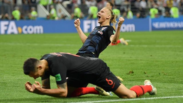 Croatian footballer Domagoj Vida celebrates his side's victory over England in the FIFA World Cup this morning. Pic: Getty