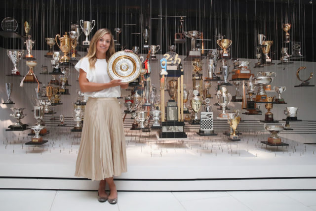 Angelique Kerber isn't sure what's better: winning Wimbledon or being a Porsche brand ambassador. Pic: Getty