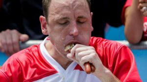 Joey Chestnut eats 74 hotdogs to win his 11th Nathan’s Fourth of July Hot Dog-Eating Contest in New York today. Pic: Getty
