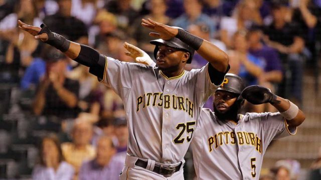 Two Pittsburgh Pirates celebrate after scoring. Pic: Getty