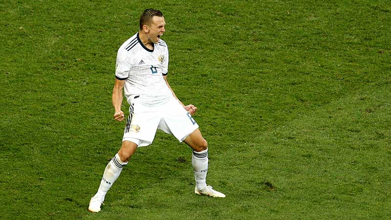 Denis Cheryshev of Russia celebrates after scoring a penalty in his team's victory over Spain in the World Cup last night. Pic: Getty
