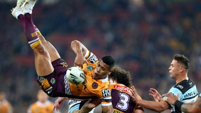 Bronco Jamayne Isaako is tackled in the air in a round 20 NRL match. Pic: Getty