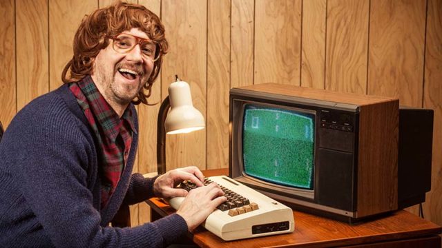 A computer nerd typing on a Commodore 64. Pic: Getty