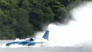 Donald Campbell's iconic Bluebird speeds along the Loch Fad in Scotland for the first time for 50 years yesterday. Pic: Getty