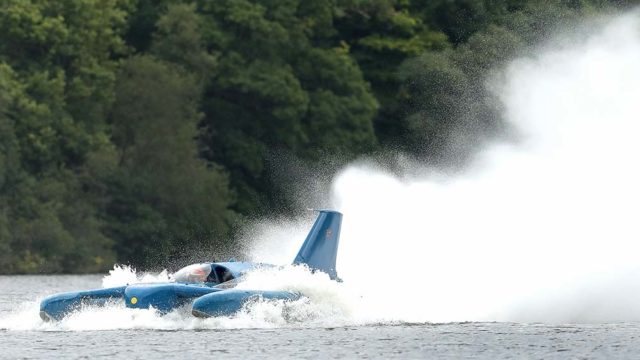 Donald Campbell's iconic Bluebird speeds along the Loch Fad in Scotland for the first time for 50 years yesterday. Pic: Getty