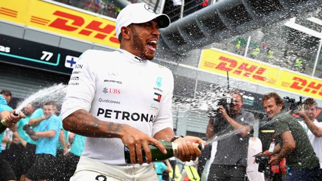 Lewis Hamilton celebrates a come-from-behind victory at the F1 Italian Grand Prix. Pic: Mark Thompson/Getty Images