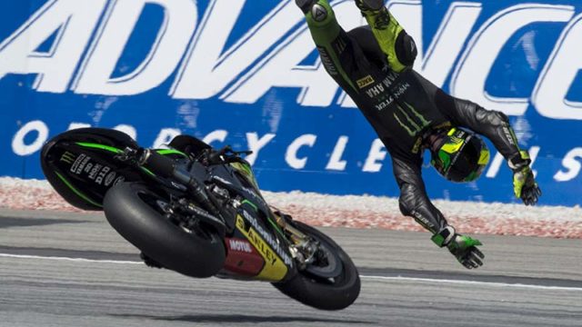 Pol Espargaro of Spain crashes out during the 2014 Malaysia MotoGP. Pic: Getty