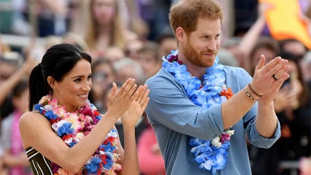 Prince Harry and Duchess Meghan at Sydney's Bondi Beach on Friday morning. Pic: Getty