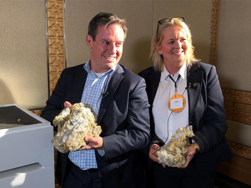 RNC Minerals CEO Mark Selby and Precious Metals Investment Symposium organiser Kerry Stevenson showing off some of the smaller (and not-so-heavy-to-hold) specimens.