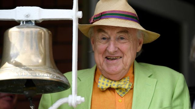 Test Match Special commentator Henry Blofeld rings the five minute bell ahead of day three of the 1st Investec Test match between England and South Africa at Lord's Cricket Ground on July 8, 2017 in London, England. Pic: Getty.