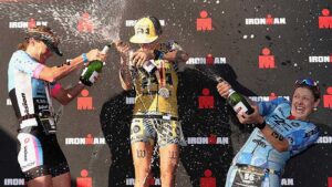 Aussie Carrie Lester, left, on the winners podium at the Top Pro 2018 Iron Woman event in Arizona at the weekend. Pic: Getty