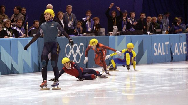 Australia's first ever Winter Gold medal winner Steven Bradbury crosses the line. Pic: Getty