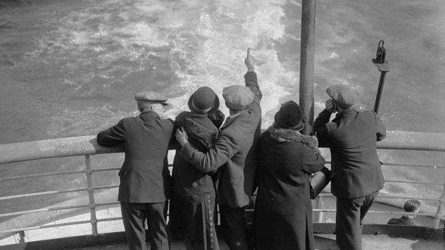 People on boat leaving Canada, emigrants, Getty